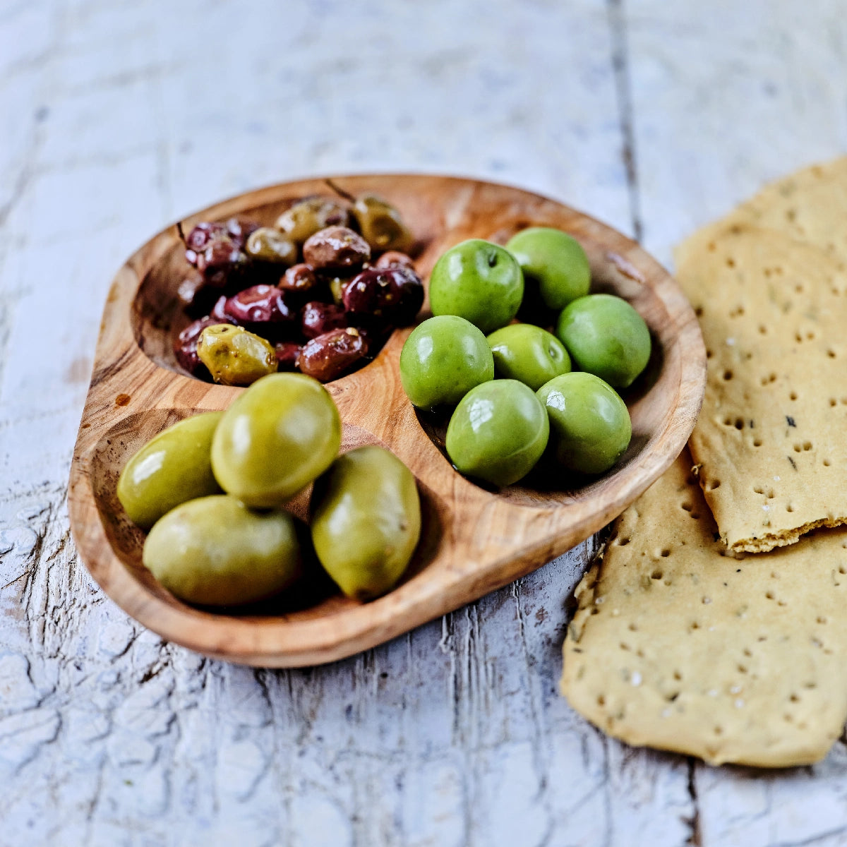 Nocellara del Belice, græske oliven i olie og krydderier og Bella di Spagna oliven fra Oliviers & Co