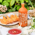 Ekstra jomfru olivenolie i smuk flaske, på et fint dækket sommerbord, Andalusien limited edition, Oliviers & Co