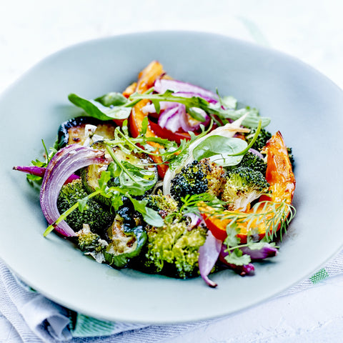 Salat med olie eddike dressing øko grøn citronolie og pink grapefrugteddike